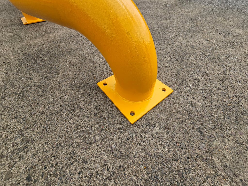 Heavy-duty yellow loading bay wheel guides – product view