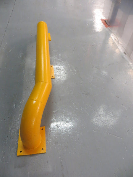 Yellow steel loading bay wheel guides viewed from the side