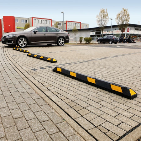 The Park-AID Wheel Stops with yellow reflective panels