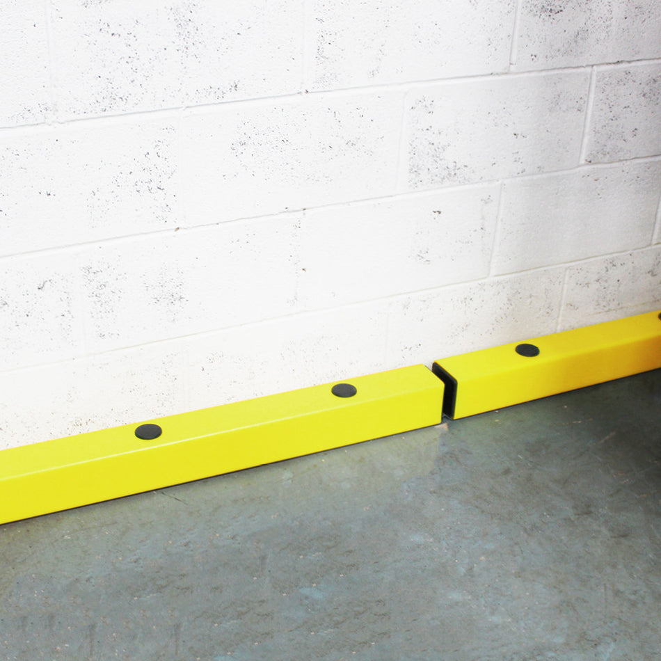 Floor level barrier for low-level warehouse protection